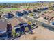Aerial view of a residential area with a golf course and mountain views at 6513 S Fairway Dr, Gold Canyon, AZ 85118