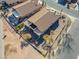 Aerial view of a house with a private pool and covered patio in a desert community at 6513 S Fairway Dr, Gold Canyon, AZ 85118