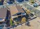 Aerial view of a home with a covered patio and desert landscaping in a residential neighborhood at 6513 S Fairway Dr, Gold Canyon, AZ 85118