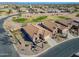 Aerial view of community featuring well-maintained homes, golf course, and scenic landscape at 6513 S Fairway Dr, Gold Canyon, AZ 85118