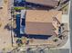 Aerial view shows the home's tile roof, covered patio, and established landscaping at 6513 S Fairway Dr, Gold Canyon, AZ 85118