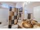 Bathroom featuring a vanity sink with granite countertop, and tub with shower at 6513 S Fairway Dr, Gold Canyon, AZ 85118