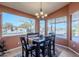 Cozy dining room filled with natural light showcasing the views of the surrounding landscape at 6513 S Fairway Dr, Gold Canyon, AZ 85118