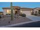 Charming single-story home with desert landscaping and a two-car garage at 6513 S Fairway Dr, Gold Canyon, AZ 85118