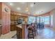 Stylish kitchen with granite counters, modern appliances, and an adjacent dining area at 6513 S Fairway Dr, Gold Canyon, AZ 85118