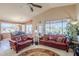 Bright and airy living room showcasing the seamless connection to the dining and outdoor spaces at 6513 S Fairway Dr, Gold Canyon, AZ 85118