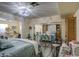 Bedroom with a mirrored closet and open access to another room at 654 S 83Rd Way, Mesa, AZ 85208