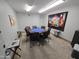 Cozy card room furnished with a poker table, chairs, and wall art, perfect for card games and entertainment at 654 S 83Rd Way, Mesa, AZ 85208