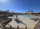 Inviting community pool area with lounge chairs, shaded seating, and a spa, perfect for relaxation and social gatherings at 654 S 83Rd Way, Mesa, AZ 85208