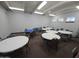 Recreation room furnished with tables and chairs, providing space for various games and social activities at 654 S 83Rd Way, Mesa, AZ 85208