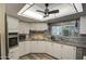 Modern kitchen with stainless steel appliances, stone backsplash, and ample counter space at 654 S 83Rd Way, Mesa, AZ 85208