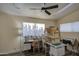 Bright office space featuring a model home and good lighting at 654 S 83Rd Way, Mesa, AZ 85208