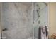 Spacious walk-in shower with marble surround and built-in niche at 654 S 83Rd Way, Mesa, AZ 85208