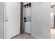 Conveniently located stackable washer and dryer unit next to the entryway door for easy laundry access at 6604 W Kingston Ln, Glendale, AZ 85306