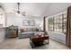 Inviting living room with vaulted ceiling and abundant natural light at 6604 W Kingston Ln, Glendale, AZ 85306