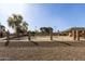 Community pool area featuring a fence and desert landscaping at 6604 W Kingston Ln, Glendale, AZ 85306
