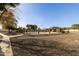 Community pool area featuring a gazebo and well maintained landscaping at 6604 W Kingston Ln, Glendale, AZ 85306