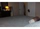 Bedroom featuring a modern bed with gray and brown patterned bedding at 7807 E Main St # D-32, Mesa, AZ 85207