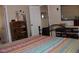 Bedroom with patterned bedding, wooden floors and built in storage at 7807 E Main St # D-32, Mesa, AZ 85207