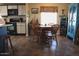 Kitchen and Dining area with table, chairs and appliances at 7807 E Main St # D-32, Mesa, AZ 85207