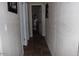 Hallway features tile floor and neutral paint at 7807 E Main St # D-32, Mesa, AZ 85207
