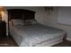 Cozy main bedroom with a large bed, side table, and soft lighting for a restful retreat at 7807 E Main St # D-32, Mesa, AZ 85207