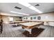 Billiard room with multiple pool tables, carpeted floor, and natural light at 8103 E Southern Ave # 119, Mesa, AZ 85209