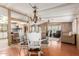 Well-lit dining area with open layout to living room and kitchen, perfect for entertaining at 8103 E Southern Ave # 119, Mesa, AZ 85209