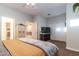 Bedroom with carpet featuring a ceiling fan and closet at 8362 W Rosewood Ln, Peoria, AZ 85383