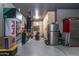 Well-organized garage space featuring custom cabinets and durable epoxy flooring for optimal functionality at 8362 W Rosewood Ln, Peoria, AZ 85383