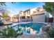 Backyard pool with desert landscaping offers a private oasis perfect for relaxation and entertainment at 8362 W Rosewood Ln, Peoria, AZ 85383
