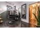 Salon interior featuring stylish decor, hair styling chairs, and a sleek, modern design at 8362 W Rosewood Ln, Peoria, AZ 85383