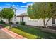 Charming single story home with mature landscaping, a well-kept yard, and white exterior at 8742 E Via De La Luna --, Scottsdale, AZ 85258