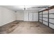 Spacious garage featuring ample storage cabinets and an automatic door opener at 8742 E Via De La Luna --, Scottsdale, AZ 85258