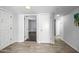 Hallway with tiled floors, white doors, and easy access to other rooms at 8742 E Via De La Luna --, Scottsdale, AZ 85258