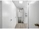 Hallway features wood-look tile flooring and multiple closets for ample storage at 8742 E Via De La Luna --, Scottsdale, AZ 85258