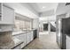 Modern kitchen featuring granite countertops, stainless steel appliances, and bright lighting at 8742 E Via De La Luna --, Scottsdale, AZ 85258