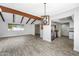 Open living and dining area with vaulted ceilings and stainless steel appliances at 8742 E Via De La Luna --, Scottsdale, AZ 85258