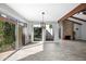 Bright living room featuring vaulted ceilings, fireplace, and access to the patio at 8742 E Via De La Luna --, Scottsdale, AZ 85258