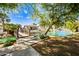 Picturesque pond with walking bridge, fountain, and community amenities in the background at 8742 E Via De La Luna --, Scottsdale, AZ 85258