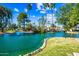 Scenic view of the community pond with lush landscaping and water features at 8742 E Via De La Luna --, Scottsdale, AZ 85258