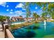 Community pool and recreation area overlooking a serene pond and lush landscaping at 8742 E Via De La Luna --, Scottsdale, AZ 85258