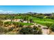 Scenic golf course view with lush green fairways and mountain views at 9671 E Cavalry Dr, Scottsdale, AZ 85262