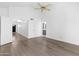 Spacious bedroom with vaulted ceiling, hardwood floors, neutral walls, and an open doorway at 10076 E Calle De Cielo E Cir, Scottsdale, AZ 85258