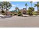Inviting community entrance with lush landscaping, palm trees, and well-maintained facilities at 10076 E Calle De Cielo E Cir, Scottsdale, AZ 85258