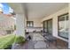 Inviting covered patio features brick pavers and comfortable seating perfect for outdoor enjoyment at 10076 E Calle De Cielo E Cir, Scottsdale, AZ 85258