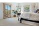 Bright main bedroom with floor-to-ceiling windows and desert views at 10379 E White Feather Ln, Scottsdale, AZ 85262