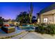 Backyard with a pool, spa, and lounge chair, perfect for relaxing and enjoying the desert scenery at 10379 E White Feather Ln, Scottsdale, AZ 85262
