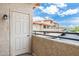 Balcony showcasing complex exterior, community parking, and neighborhood view at 10410 N Cave Creek Rd # 2114, Phoenix, AZ 85020