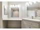 Bright bathroom boasts marble countertops, vanity, and shower with modern fixtures at 10410 N Cave Creek Rd # 2114, Phoenix, AZ 85020
